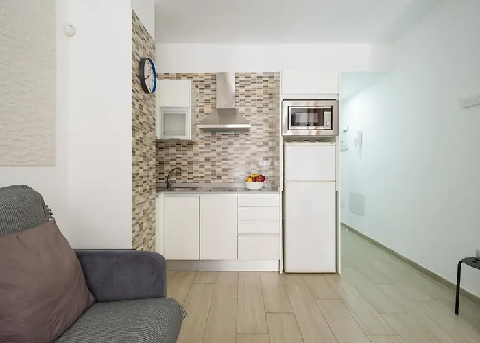 By Playa De Canteras *