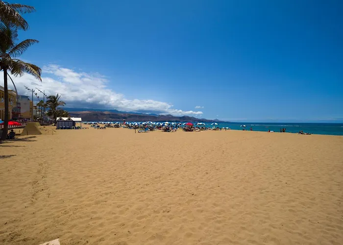 By Playa De Canteras *