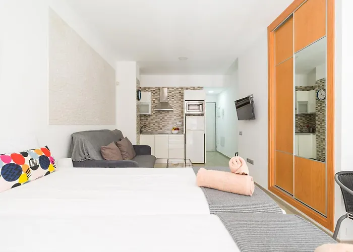 By Playa De Canteras *