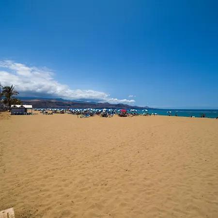 By Playa De Canteras *
