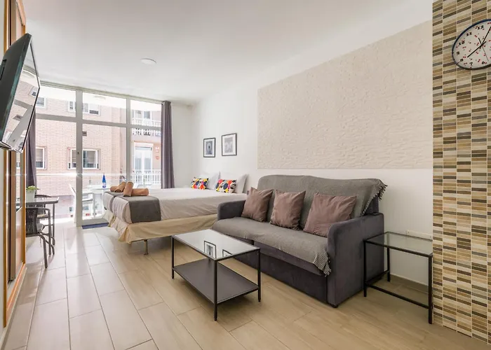 By Playa De Canteras *